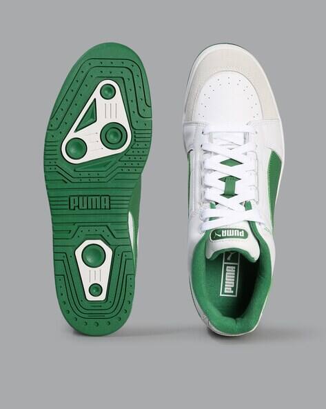 green puma sneakers