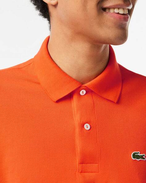 Orange lacoste store t shirt