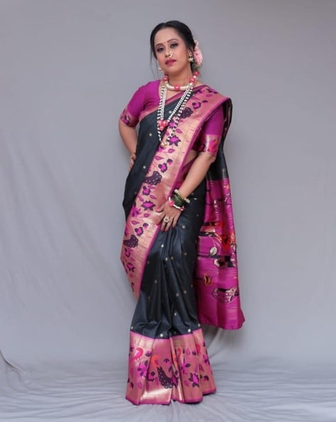 Floral design on black saree complimenting each other. | Fancy sarees,  Party wear sarees, Anarkali dress