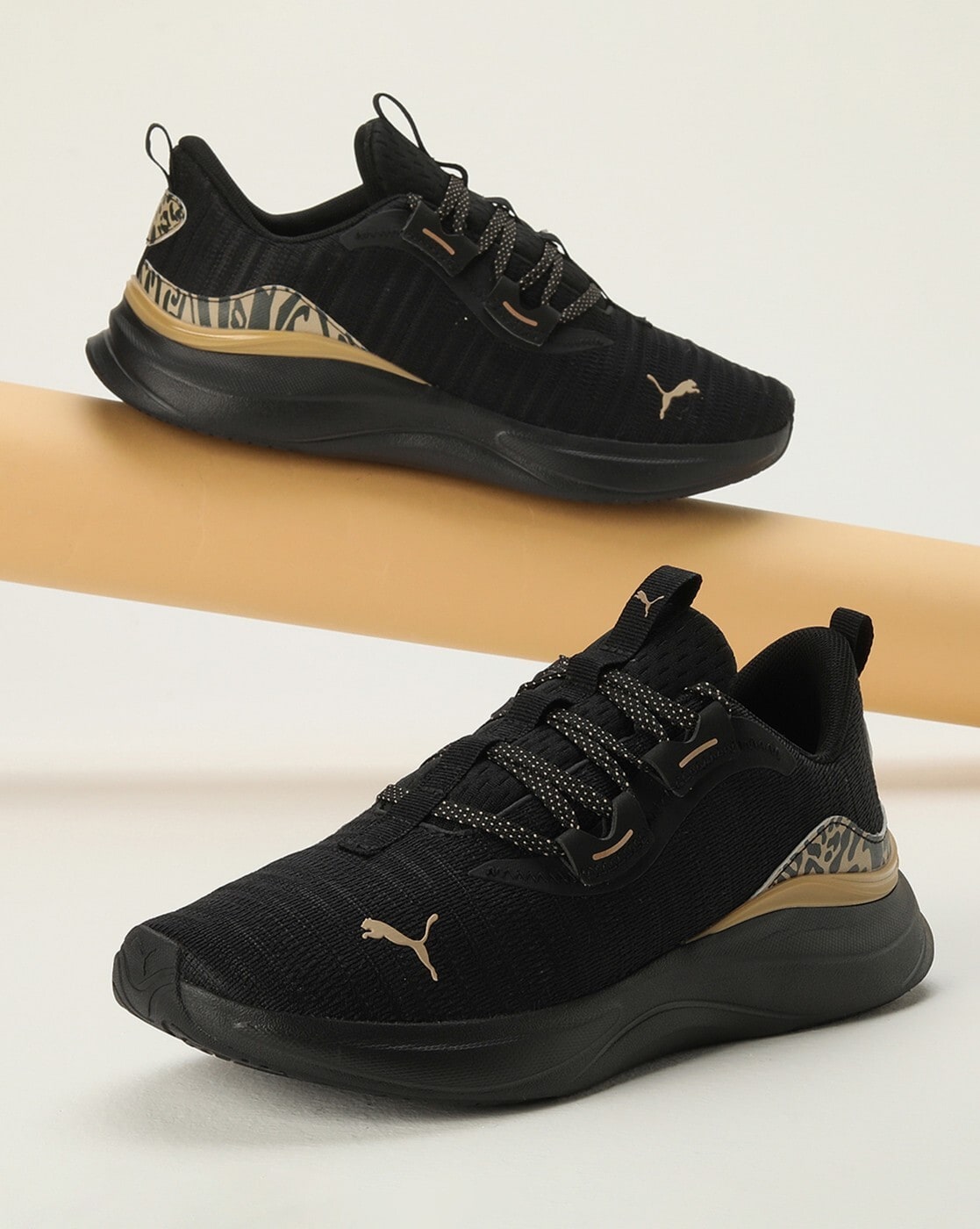 Puma black best sale gold shoes