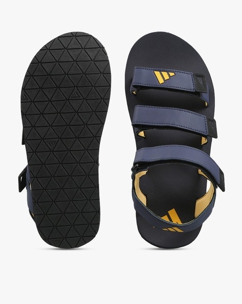 Navy blue adidas discount slides