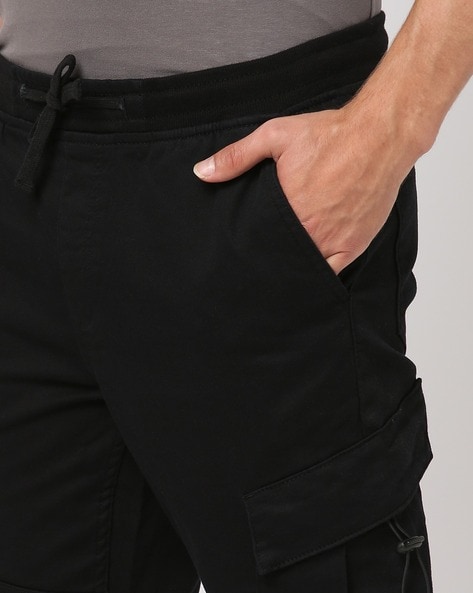 Buy Black Trousers & Pants for Men by DNMX Online