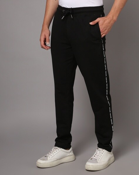 Buy online Black Solid Joggers Track Pant from Sports Wear for Men by U.s.  Polo Assn. for ₹1399 at 0% off