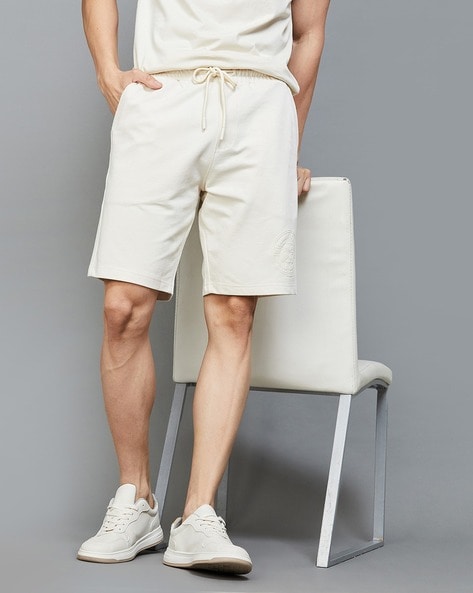 Buy Beige Shorts & 3/4ths for Men by FAME FOREVER BY LIFESTYLE Online