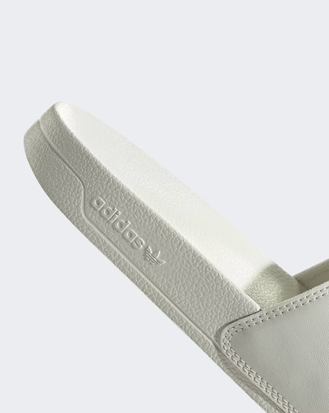 Adidas adilette lite best sale womens ivory slide sandals