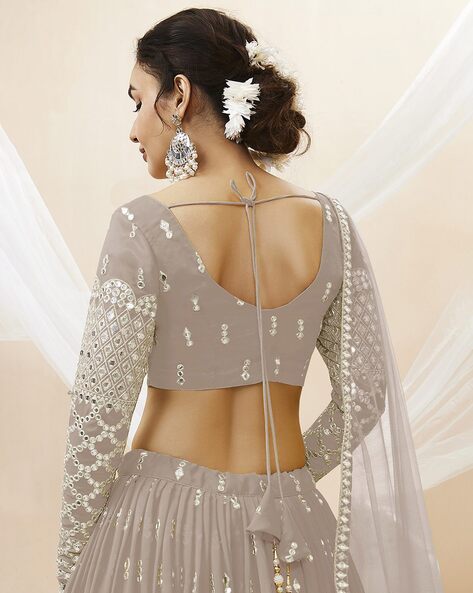 Silver Net Sequins Embroidered Lehenga Set Design by Seema Gujral at  Pernia's Pop Up Shop 2024