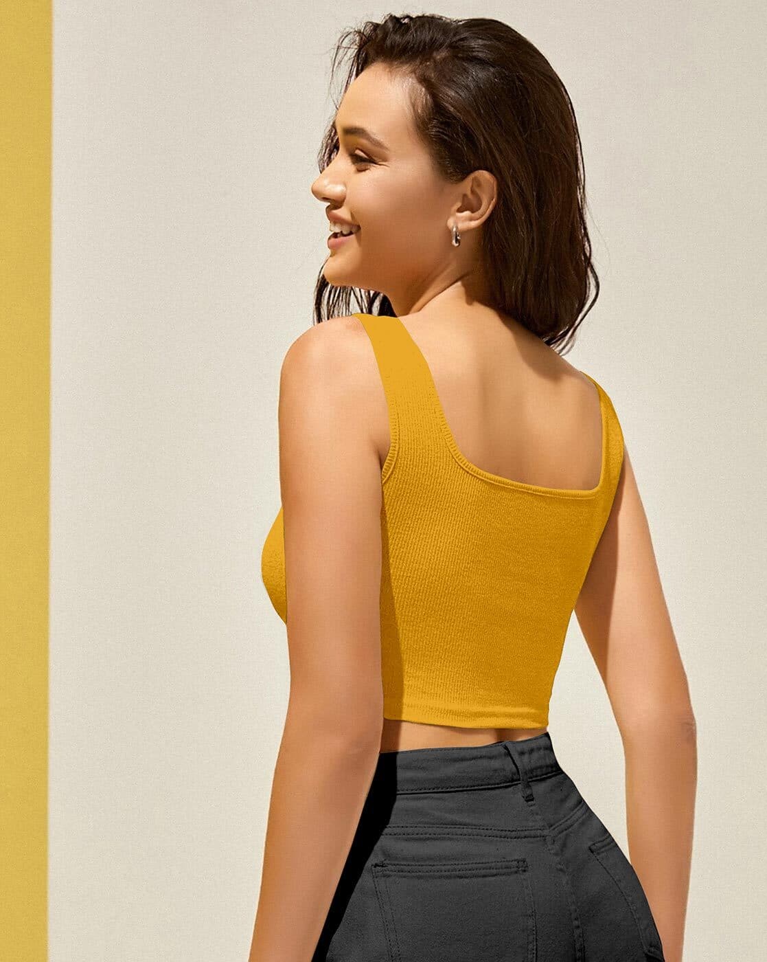 yellow sleeveless top