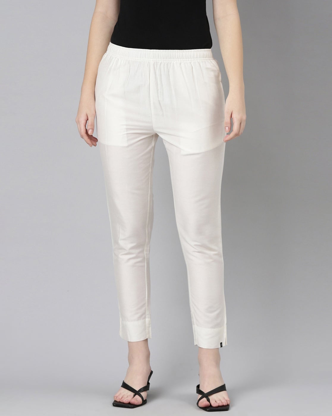 Meghan White Trousers | Trousers | NADINE MERABI