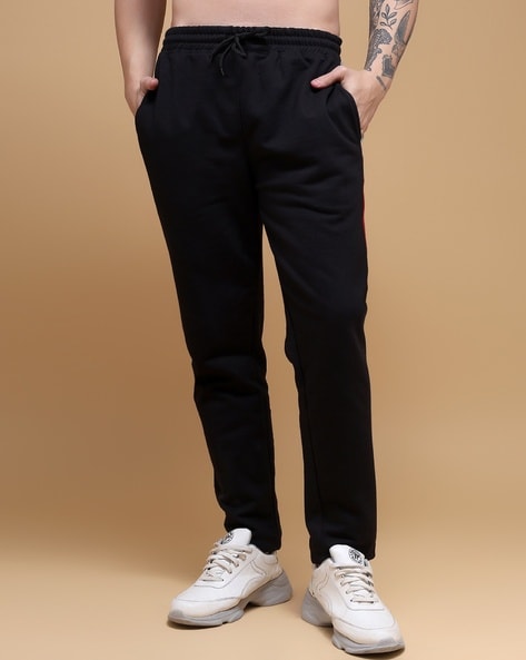 Buy Green Track Pants for Men by MVMT Online | Ajio.com