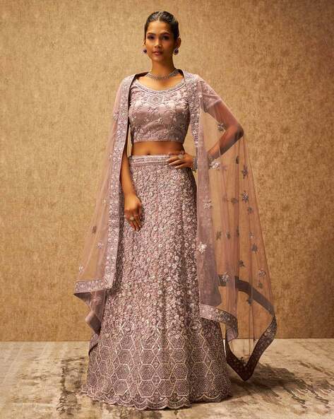 PETAL PINK LEHENGA SET WITH ALL OVER SELF AND SILVER EMBROIDERY PAIRED WITH  A MATCHING DUPATTA AND SILVER HIGHLIGHTS. - Seasons India