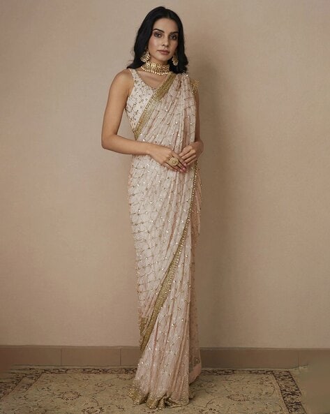 Cream Color Pure Georgette Sequin Saree - Tirja Collection Yf#22932 at Rs  4800.00 | सिक्विन्स वर्क साड़ी - Ozone Shield, Mumbai | ID: 2849821723655