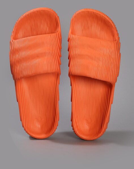 Orange adilette sales slides