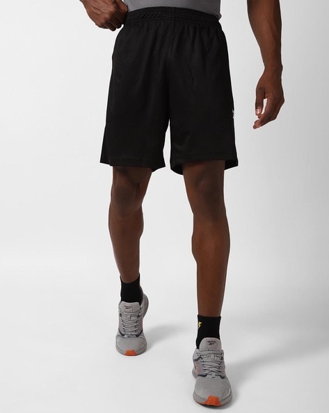 Reebok shorts with deals zipper pockets