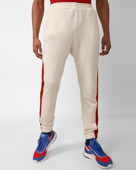 Buy Beige Track Pants for Men by REEBOK Online Ajio