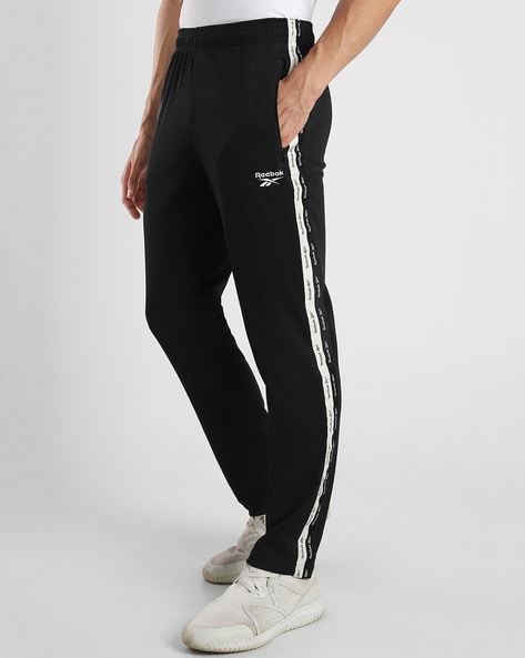 Reebok sweatpants discount with zipper pockets