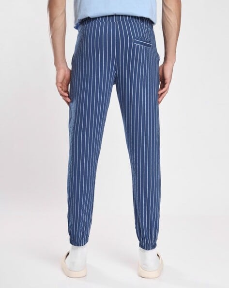 Buy online Black Striped Full Length Track Pant from Sports Wear for Men by  V-mart for ₹569 at 5% off | 2024 Limeroad.com