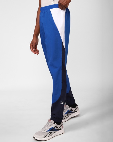Reebok Mens Train Woven Track Pants (L) At Nykaa Fashion - Your Online Shopping Store