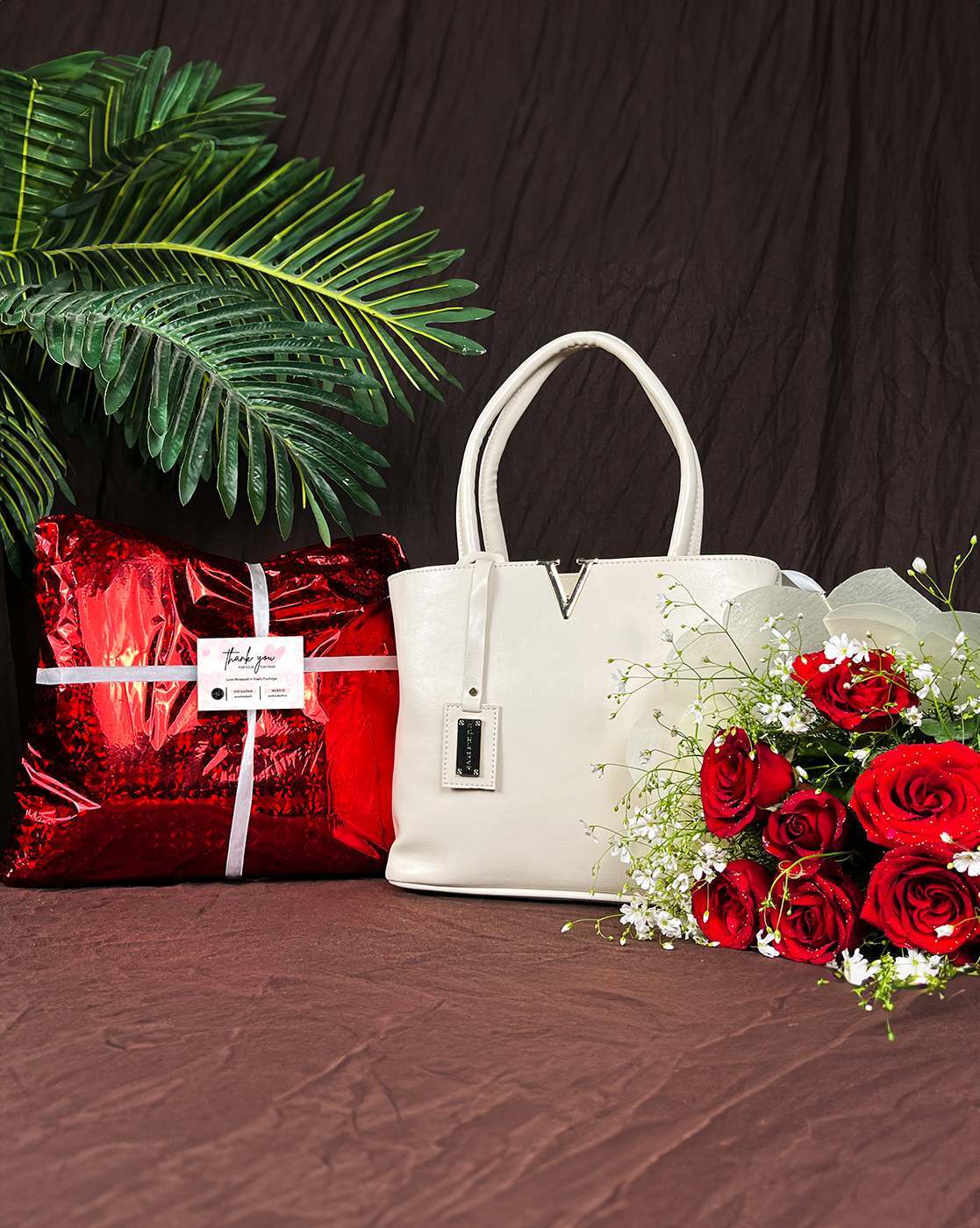 Cartier bag arrangement | Flower bag, Table decorations, Gifts