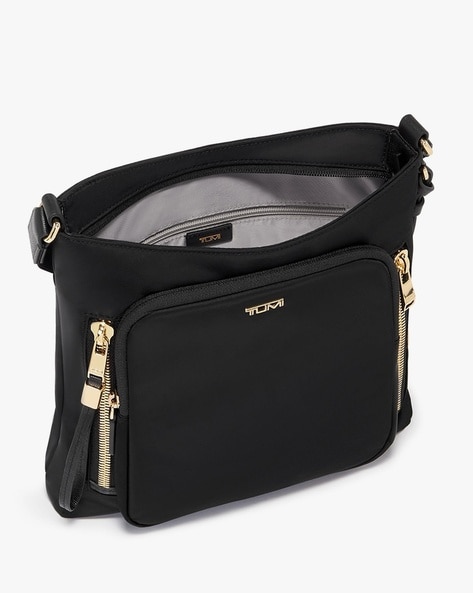 Tumi sling best sale bag ladies