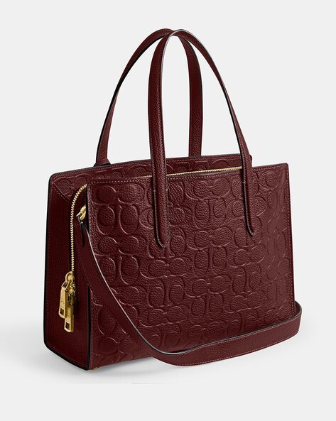 Coach charlie carryall in signature online leather