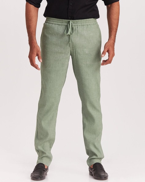 Universal Works elasticated-waistband Tapered Trousers - Farfetch
