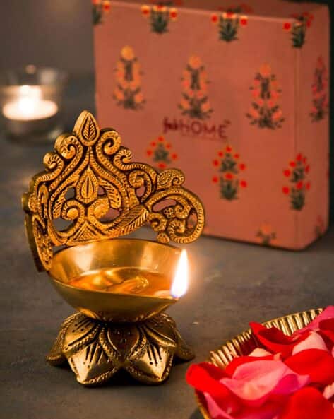 Buy Gold-Toned Showpieces Figurines for Home Kitchen by