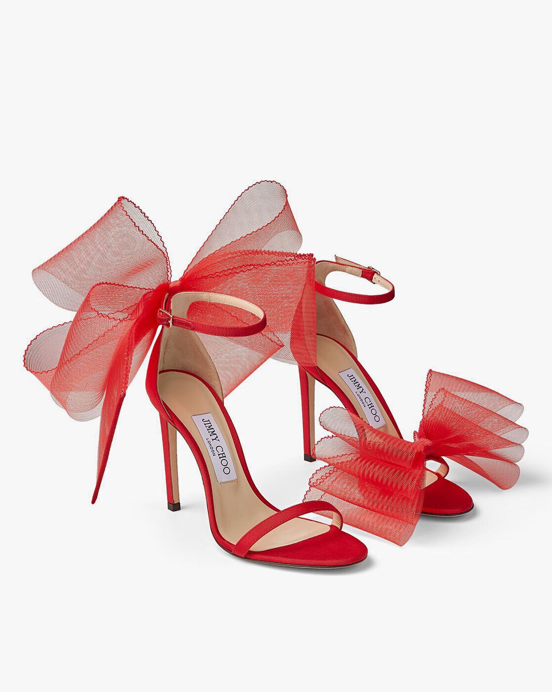 Jimmy Choo on Instagram: “Tap into your playful side with our AVELINE bow  sandals #JimmyChoo”