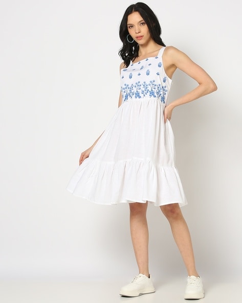 White dress with blue embroidery hotsell
