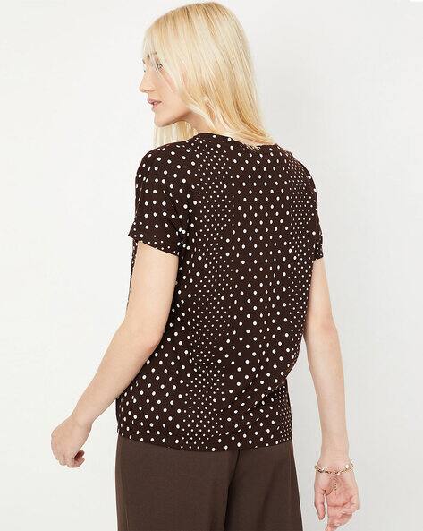 tan polka dot top