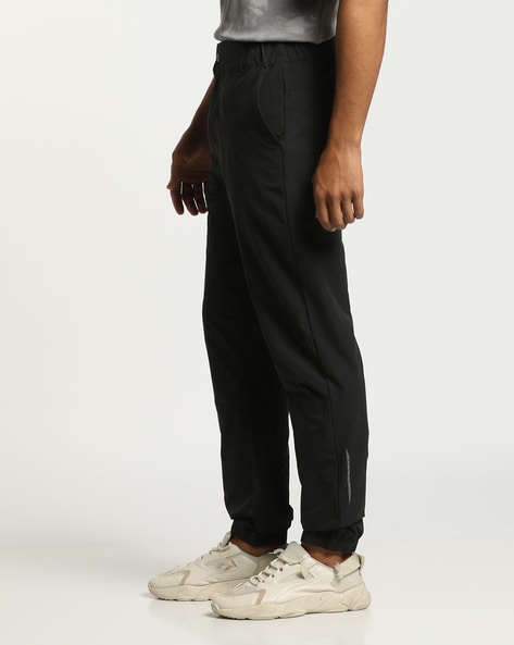 Black nylon sweatpants on sale