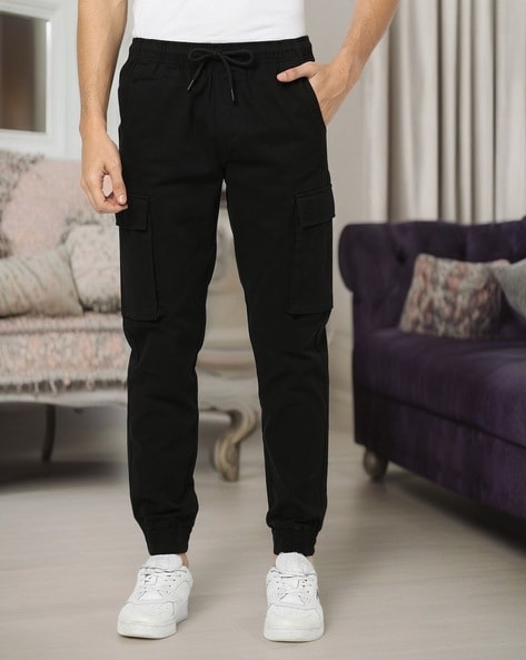 Buy Jet Black Trousers & Pants for Men by ECKO UNLTD Online