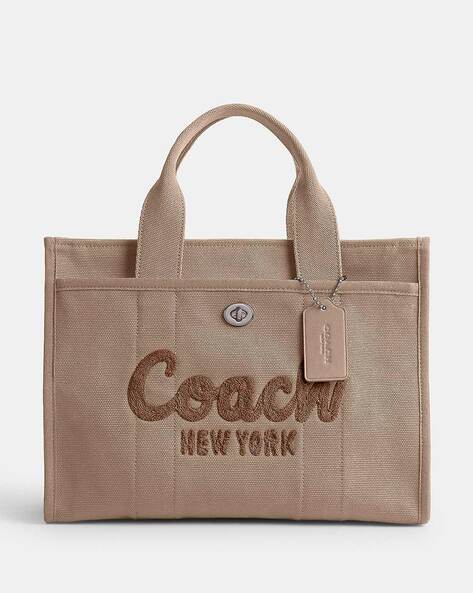 Purchases Coach purse