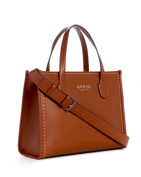 Brown and beige store guess tote with wristlet