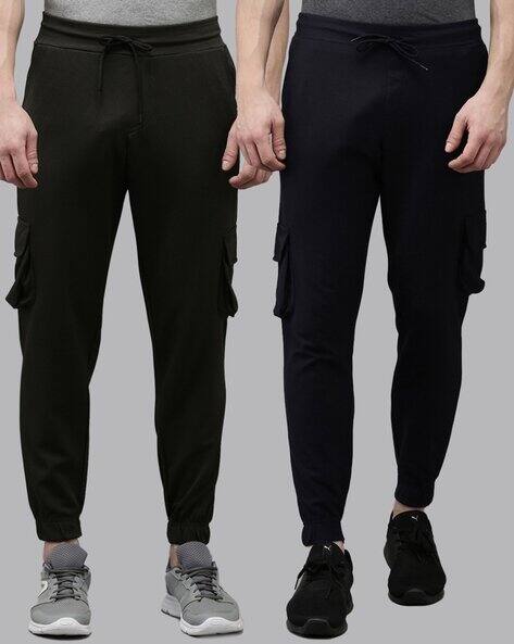 Buy Navy Blue Track Pants for Men by Madsto Online | Ajio.com