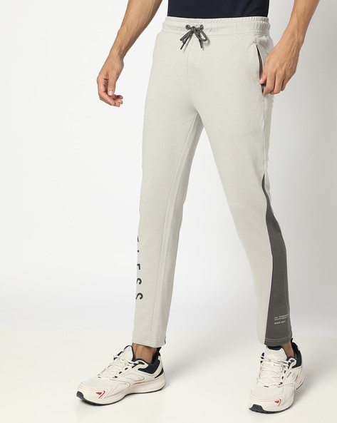 Team spirit slim fit track pants online