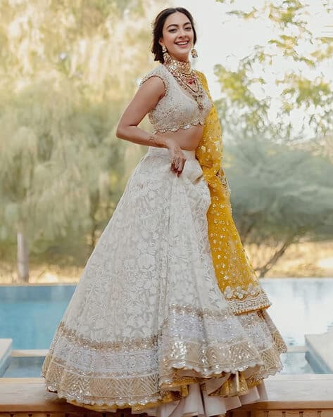 Women Embroidered Flared Lehenga Choli Set with Dupatta