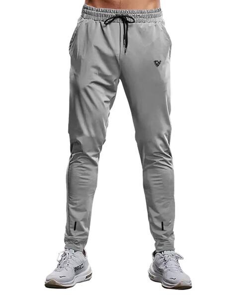EYEBOGLER Men Mid-Rise Track Pants with Elasticated Waist
