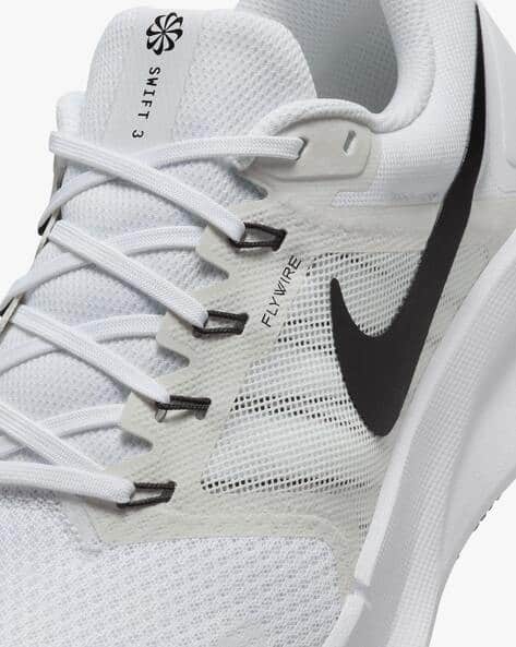 Buy White Sports Shoes for Men by NIKE Online