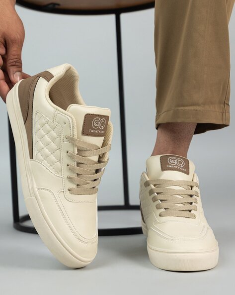 Cream sneakers on sale