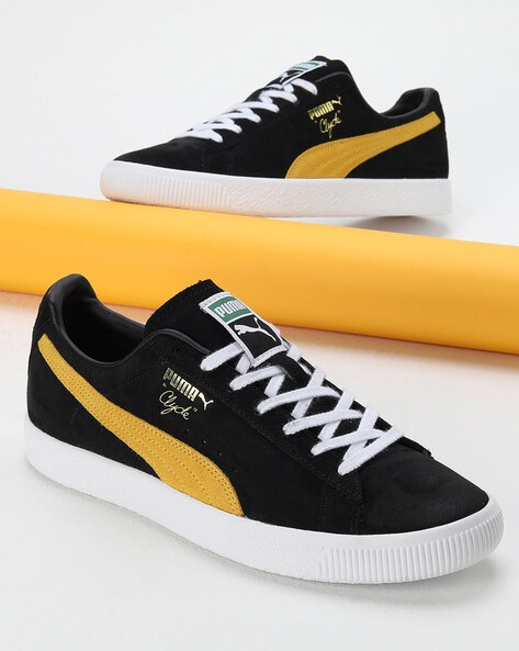 Puma black yellow shoes hotsell