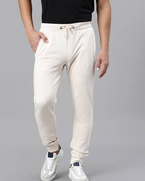 Buy Beige Track Pants for Men by Rare Rabbit Online