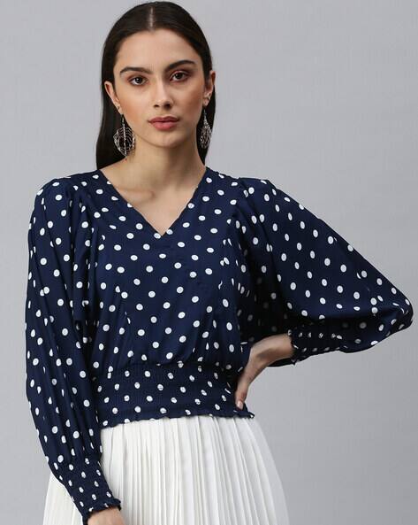navy and white spotted tops
