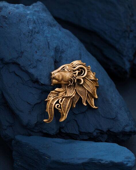 Lion brooch discount