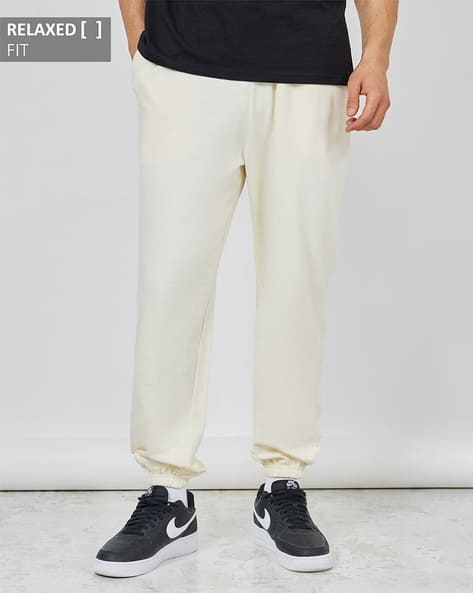 Buy Cream Track Pants for Men by Styli Online