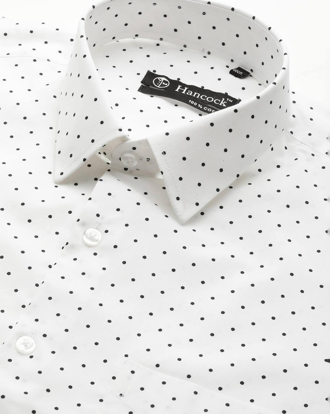 white shirt with black dots