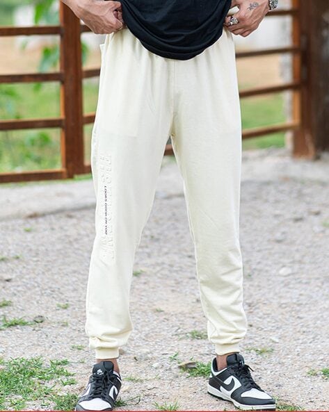 Cream jogger sweatpants sale