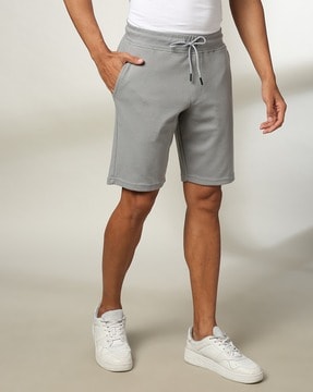 Men s Shorts 3 4ths Online Low Price Offer on Shorts 3 4ths for Men AJIO