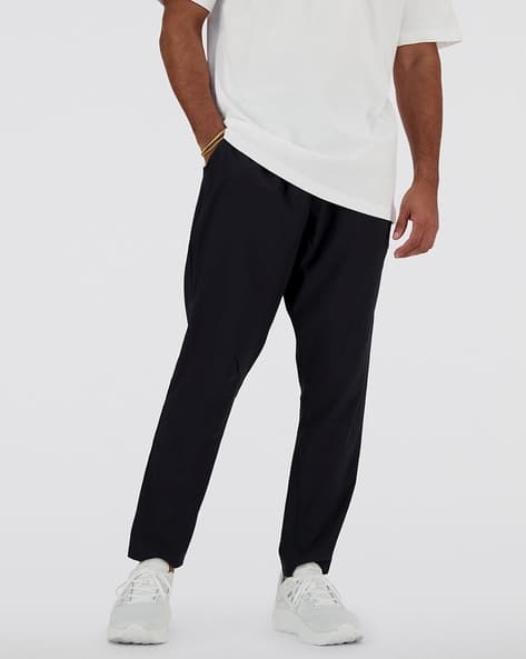 NEW BALANCE Men Sport Essentials Straight Fit Pleated Pants