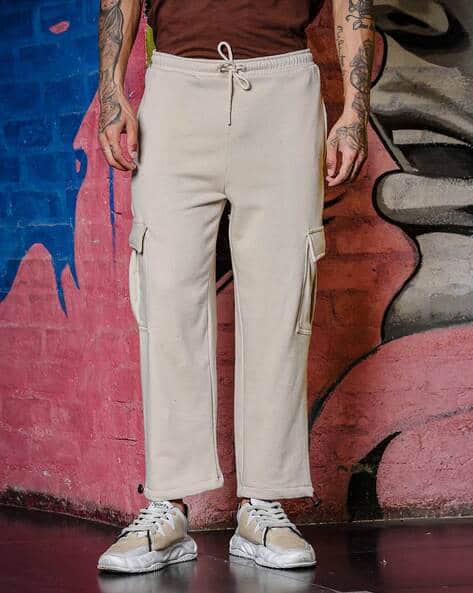 Buy Cream Trousers Pants for Men by TOM HIDDLE Online