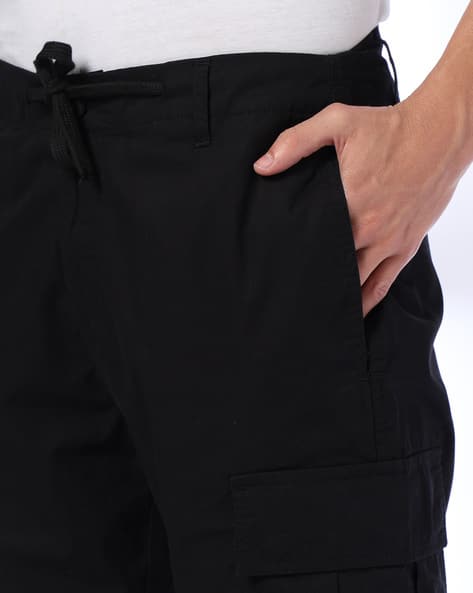 Buy Black Trousers & Pants for Men by DNMX Online | Ajio.com
